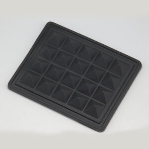 small rectangular bottom protector pad with a diamond pattern for luggage and backpacks