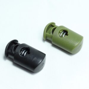 plastic cord lock or cord stopper used in garments and backpacks