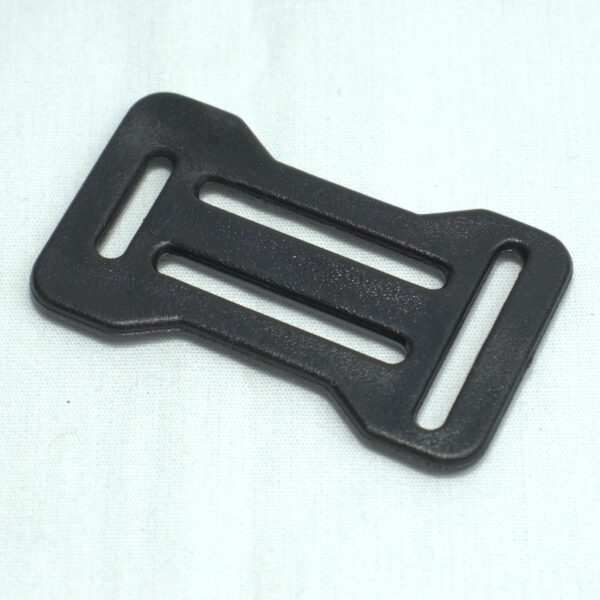 plastic buckle known as sternum adjuster for the front strap of a backpack