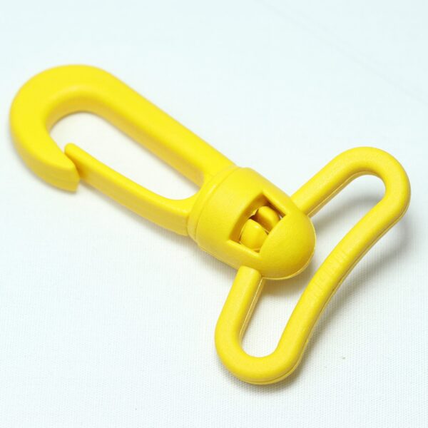 Plastic hook buckle with spring action for making removable straps for duffel and messenger bags