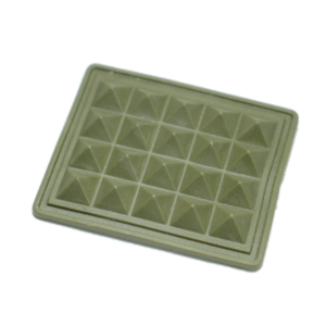 small rectangular bottom protector pad with a diamond pattern for luggage and backpacks