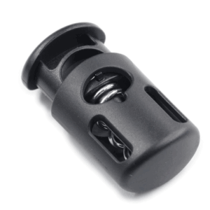 plastic cord lock or cord stopper used in rucksacks and backpacks