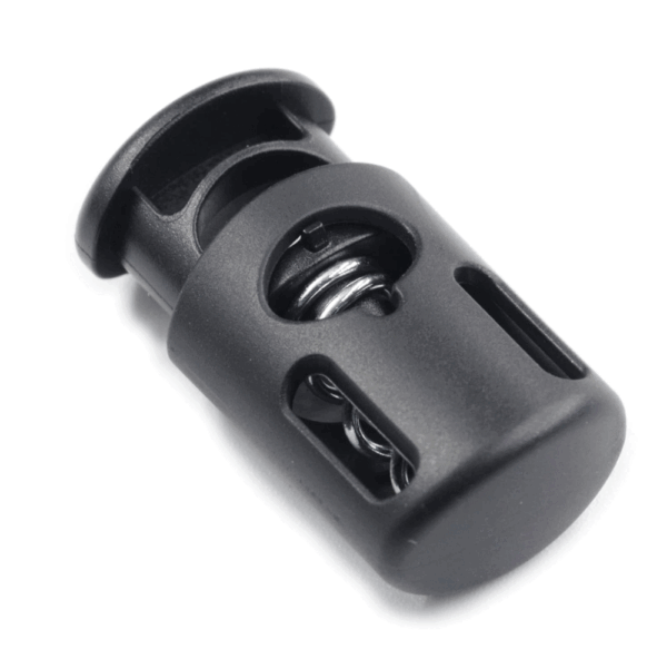 plastic cord lock or cord stopper used in rucksacks and backpacks