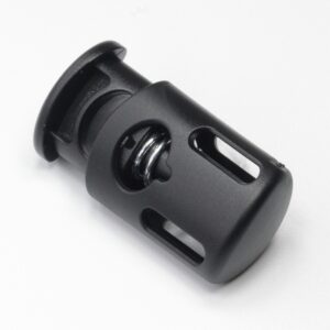 plastic cord lock or cord stopper used in rucksacks and backpacks